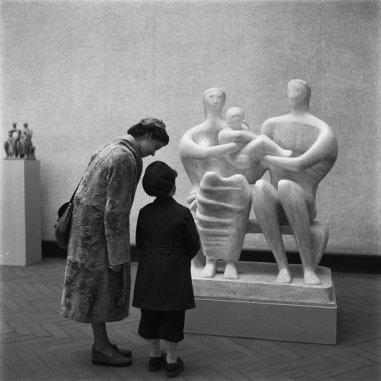 Maria Austria (1950) mother and child before 'Family Group' at an exhibition of Henry Moore, Stedelijk Museum, Amsterdam.
